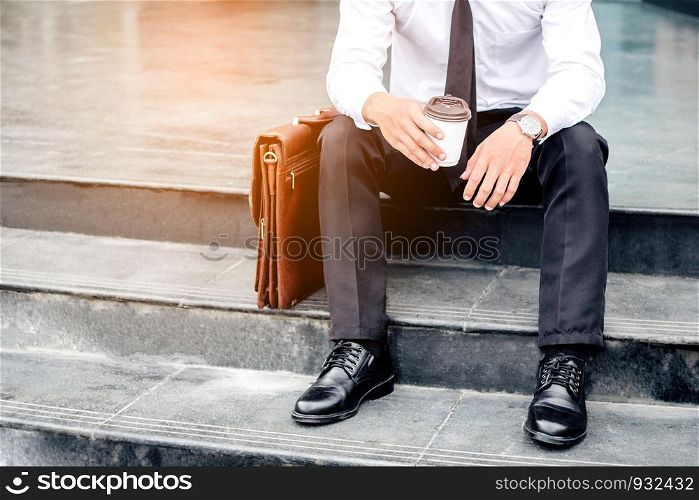 Businessman sitting and thinking Success concept