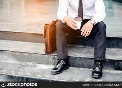 Businessman sitting and thinking Success concept