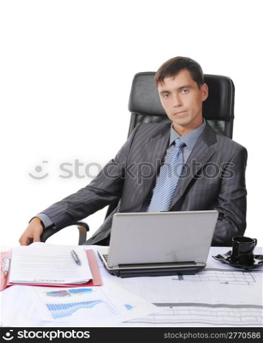 Businessman sitting before a laptop. Isolated on white background