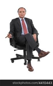 Businessman sitting in a chair