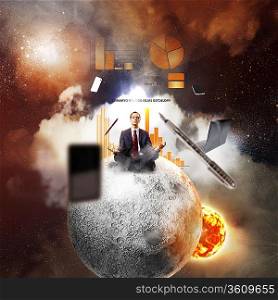 Businessman sitting in lotus flower position against space background with office stuff aloft