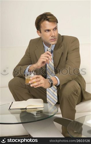 Businessman sitting on a couch