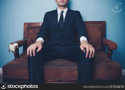 Businessman sitting on a sofa