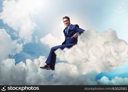 Businessman sitting on the cloud in motivitation concept