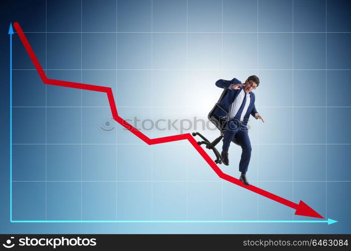 Businessman sliding down on chair in economic crisis concept