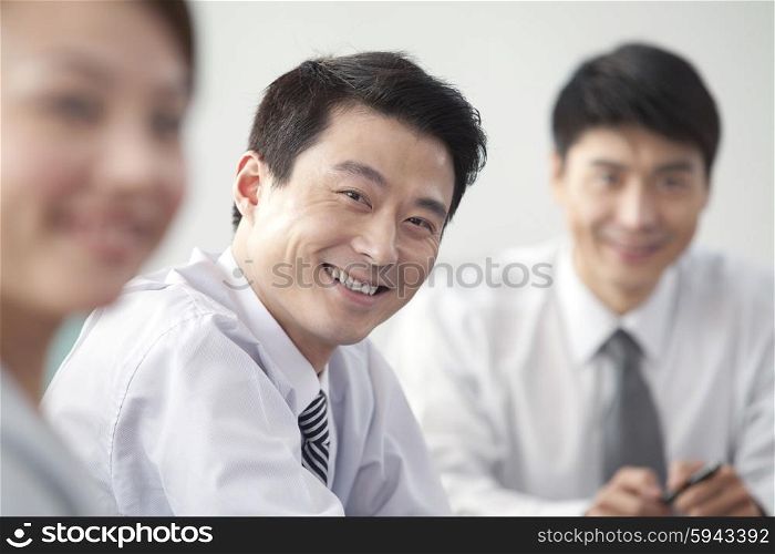 Businessman Smiling At Camera