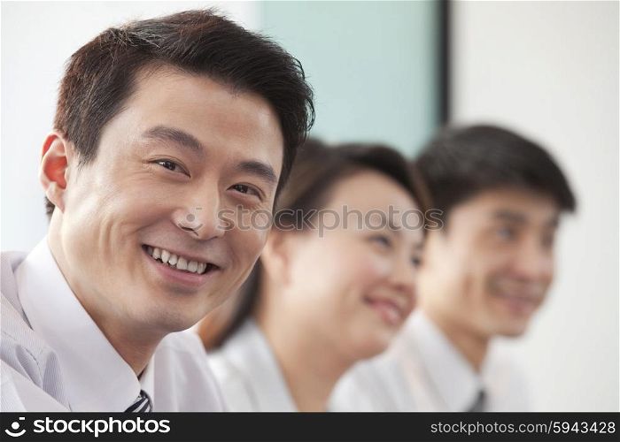 Businessman Smiling at Camera