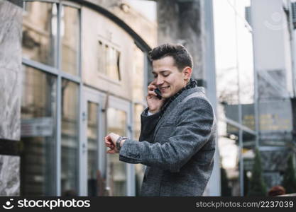 businessman smiling calling