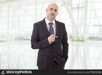 businessman smoking at the office
