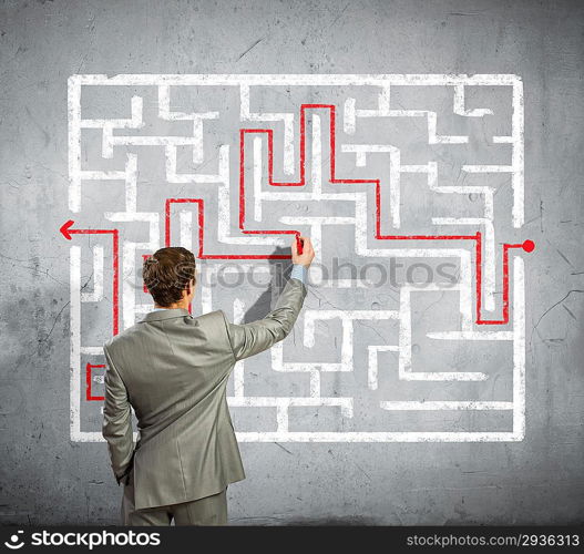 Businessman solving labyrinth problem