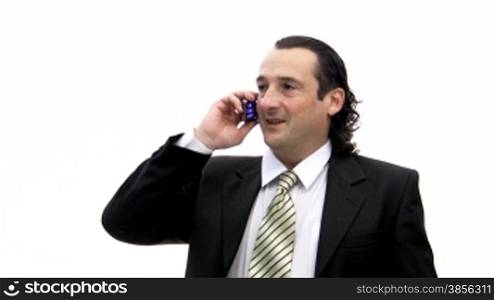 Businessman speaks by phone.