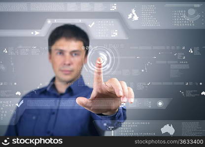 Businessman standing and working wth touch screen technology