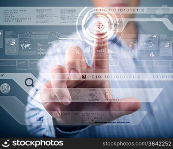 Businessman standing and working wth touch screen technology