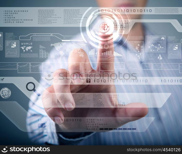 Businessman standing and working wth touch screen technology