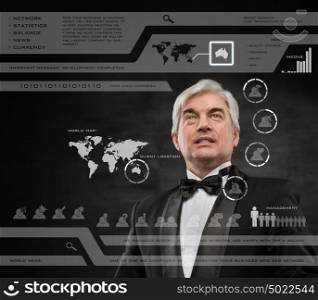 Businessman standing and working wth touch screen technology