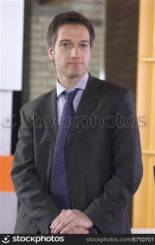 Businessman standing in an office