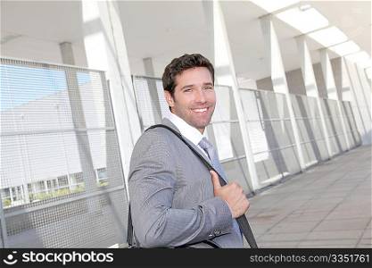 Businessman standing with briefcase