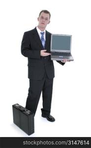 Businessman Standing With Briefcase And Open Laptop.