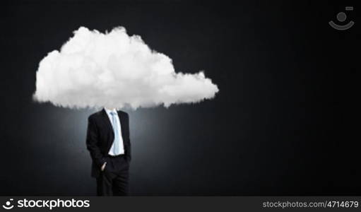 Businessman standing with his head in cloud. Floating in sky