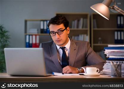 Businessman staying in the office for long hours