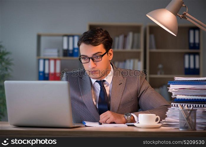 Businessman staying in the office for long hours