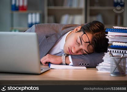 Businessman staying in the office for long hours