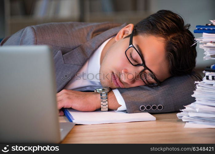 Businessman staying in the office for long hours