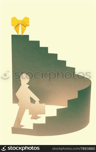 Businessman stepping up a staircase