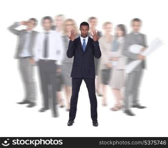 Businessman stood in front of blurred colleagues