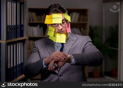 Businessman struggling with conflicting priorities during long hours. Businessman struggling with conflicting priorities during long h