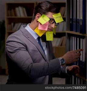 Businessman struggling with conflicting priorities during long hours. Businessman struggling with conflicting priorities during long h