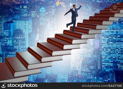 Businessman student climbing the ladder of education books