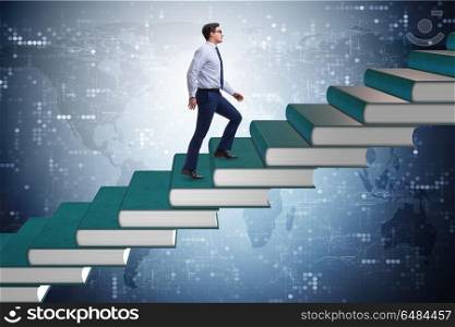Businessman student climbing the ladder of education books
