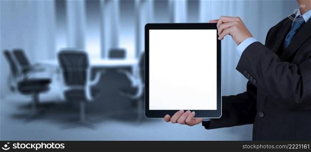 businessman success working with blank tablet computer his board room background