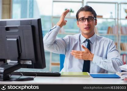 Businessman suffering from excessive armpit sweating. The businessman suffering from excessive armpit sweating