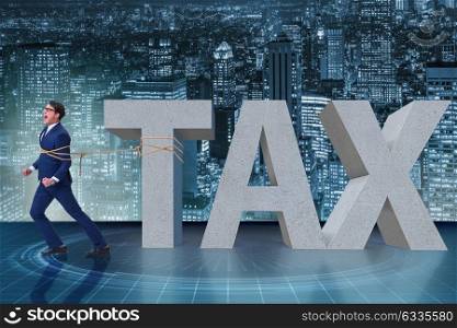 Businessman suffering from high taxes