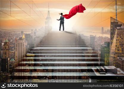 Businessman superhero pressing virtual buttons on career ladder