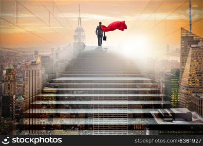 Businessman superhero successful in career ladder concept. The businessman superhero successful in career ladder concept