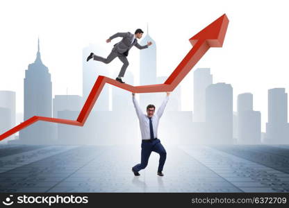 Businessman supporting growtn in economy on chart graph