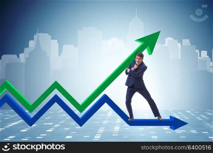 Businessman supporting growtn in economy on chart graph