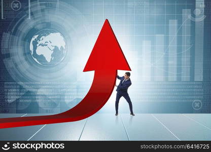 Businessman supporting growtn in economy on chart graph