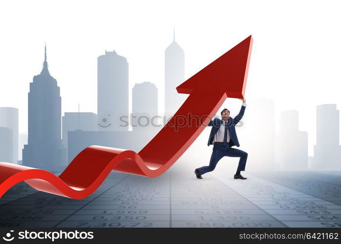 Businessman supporting growtn in economy on chart graph