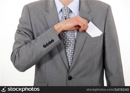 Businessman taking out business card