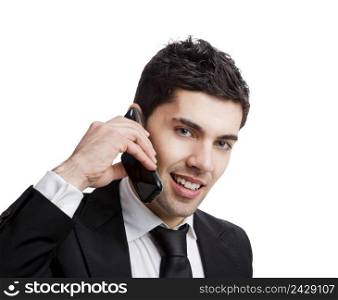 Businessman talking at cellphone, isolated over a white background 