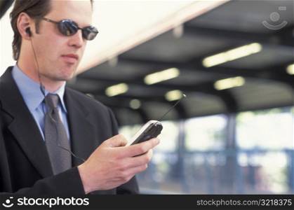 Businessman Talking Hands Free on a Cell Phone