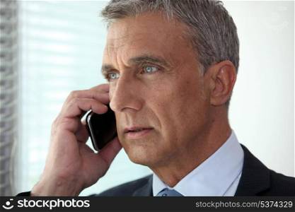 Businessman talking on his cell
