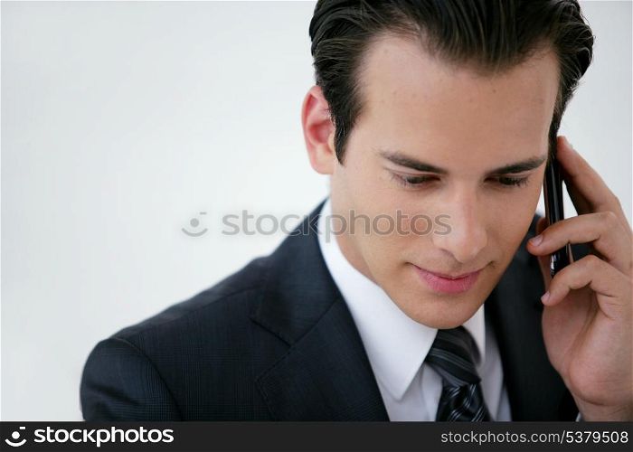 businessman talking on his cell