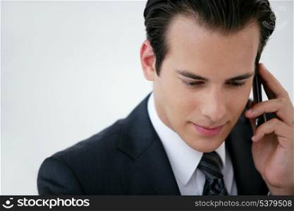 businessman talking on his cell