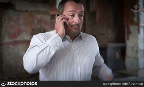 Businessman Talking On His Phone. RAW Video