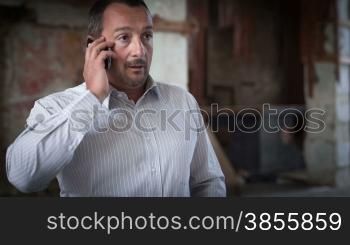 Businessman Talking On His Phone. RAW Video